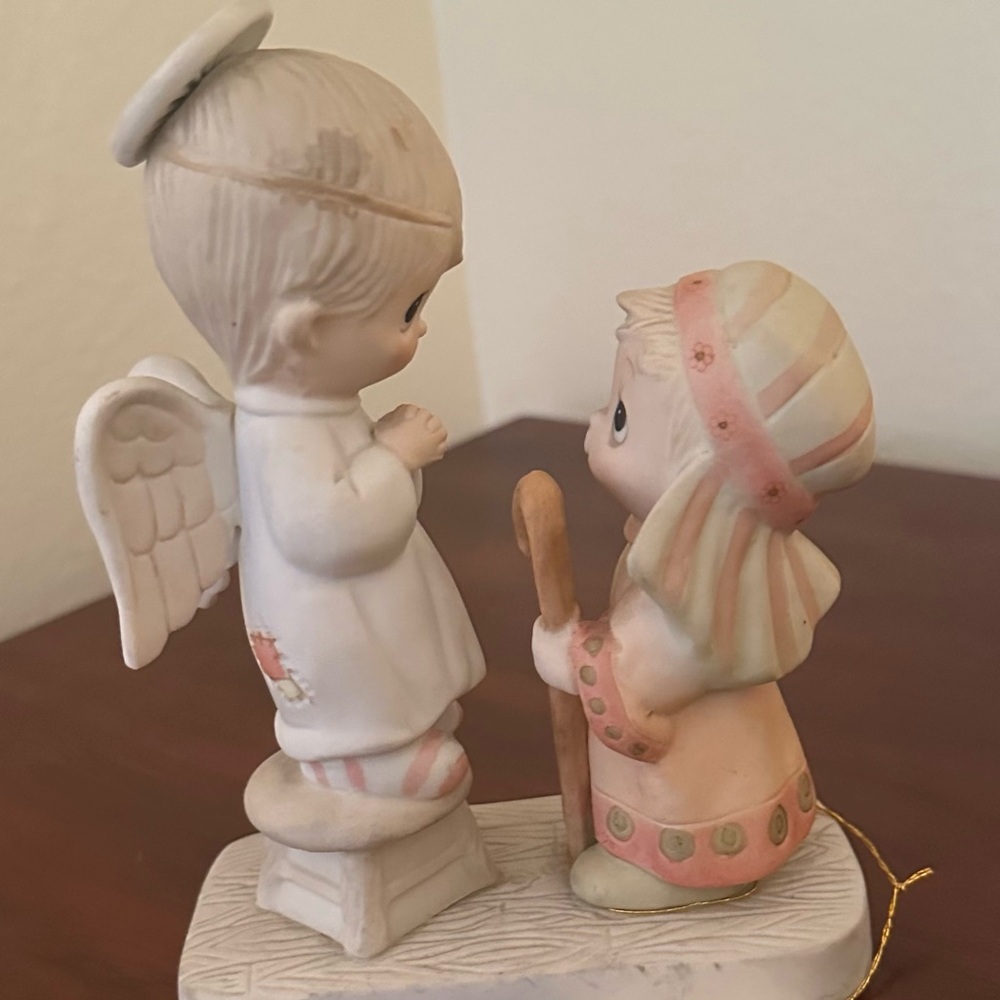 “Jesus is Born" Precious Moments porcelain figurine.